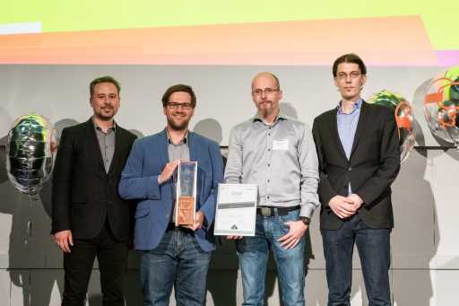 Us receiving the DIVR-Award for best tech.